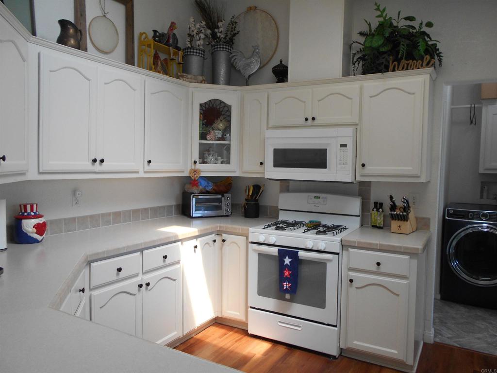 Only 7 minutes from downtown San Diego...Bayview Mobile Home Park is a family community...This 3bed/2bath home was built in 2005 & has almost 1600 sq. ft of living space ... Vaulted ceilings, beautiful LVP flooring & several ceiling fans ... If you need a MH loan, you must have loan approval before all showings...or a bank statement showing proof of funds... Buyers & buyers agent do do all inspections before the COE ...Rent space is approx. $1200 & buyers need park approval before moving in ...