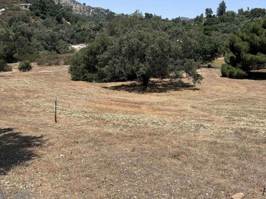 Discover the perfect blend of tranquility and convenience in this beautiful rural setting! Nestled just minutes from I-15, shopping centers, and popular restaurants, this 3.46-acre property spans two parcels, offering ample space for your vision. Enjoy the peace and privacy of the countryside without sacrificing proximity to modern amenities. With electricity and water nearby, this is an exceptional opportunity to create your dream lifestyle in a location that truly offers the best of both worlds.