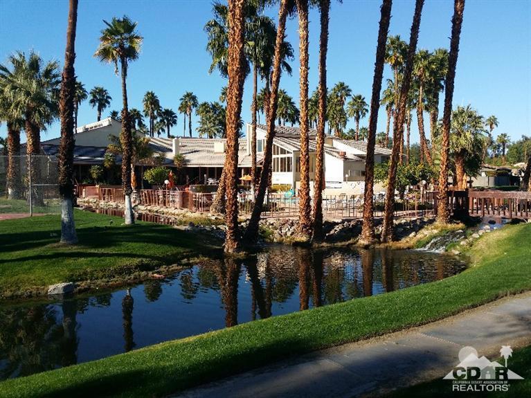 Fabulous Opportunity to own a beautiful 2 bedroom 2 bath 1536 sq. ft manufactured home located just steps from pool, gym, clubhouse, and tennis courts in a gated community in sunny Rancho Mirage! Home features french door entry, with 2 master suites one completely remodeled with separate spa bath/jet tub and tile shower, large laundry room with sink and extra storage. Family room, wet bar, and kitchen open up to private patio with insulated awning and no maintenance landscaping with plenty of room for gardening if you wanted to. The Community offers : pools, spas, gym, tennis courts, library, chiropractic office, nail salon, hair salon and so much more! An absolute must see! Very motivated seller, please come to us with your offers!