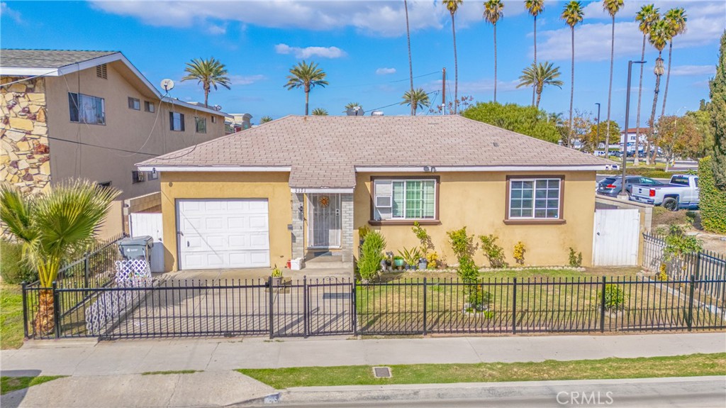 This Charming and well-kept two-bedroom, one-bath home is move-in ready and full of character for First time homebuyers. The smart floor plan maximizes space, making it feel larger than expected. One-car garage offers versatility-perfect to possibly convert into a home office, studio, or extra storage. Convenient outdoor washer and dryer hookups add to the homes functionality. The driveway accommodates one vehicle, with plenty of additional street parking for guests.Located in a prime area, its just a short walk to shopping centers,resturants, grocery stores, and public transit, including the metro green line and bus stops. Easy freeway access makes commuting a breeze!!