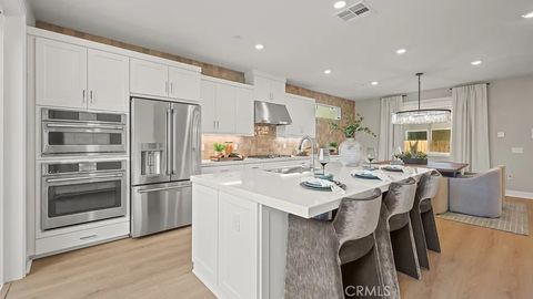 Photo of 27393 Fox Den Place, Valencia, CA 91381 (MLS # OC26055722)