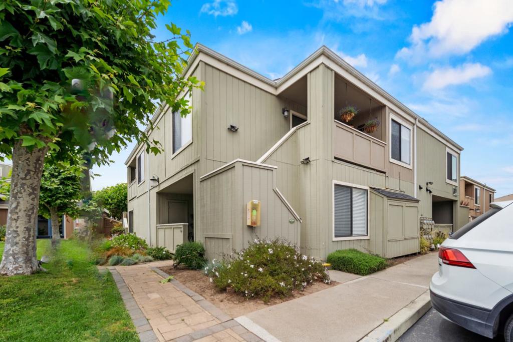 Check out this 2-bedroom, 1-bath upstairs condo in the popular gated community of Cypress Park! The sought-after Carmel plan features a main-floor bedroom and a loft-style second bedroom with a big closet. Enjoy an updated kitchen with granite counters, new stove & microhood, plus a refreshed bathroom with tile shower. Extras include dual-pane windows, under-stair storage, private storage unit, and a tiled balcony perfect for morning coffee! HOA covers sewer, garbage, roof, gate, pool, BBQ area & more. Great spot near community amenities. A smart, budget-friendly way to own your own place!