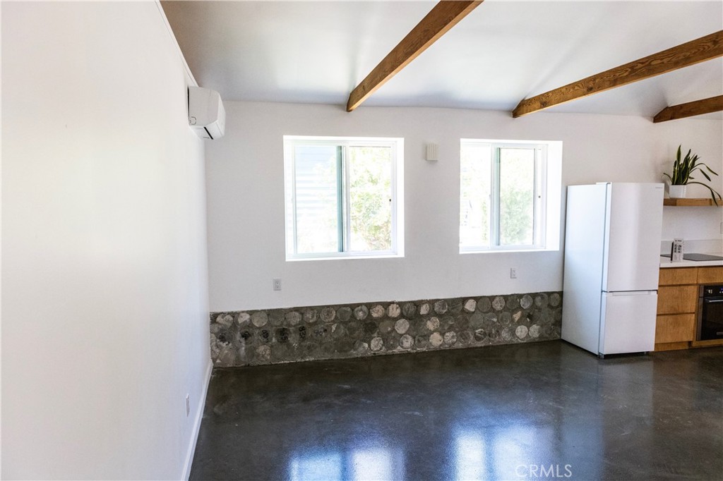 OPEN THIS SATURDAY JUNE 14Th 12-2. Experience the perfect blend of modern comfort and classic character in this studio ADU, located in the highly sought-after Rose Park Historic District. With exposed wood beams adding warmth and architectural style, this space is a true gem.
Inside, you'll find an open floor plan with vaulted ceilings, designer finishes, and tons of natural light. The kitchen features modern cabinetry and stainless-steel appliances, and a/c system while the exposed beams create a cozy yet elevated atmosphere. You'll also love the in-unit washer and dryer and private yard ideal for relaxing, entertaining, or even outdoor dining.
Set in one of Long Beach's most charming and walkable neighborhoods, you're just blocks from Retro Row, boutique shops, local cafes, and minutes from the beach.
Features Include:
Newly renovated with timeless finishes
Vaulted ceilings and exposed wood beams
In-unit washer and dryer
Full kitchen with modern appliances
Private yard space
Prime location in historic Rose Park near 4th Street, Retro Row & more
Whether you're looking for a peaceful retreat, a creative space, or a smart rental opportunity, this studio offers stylish living in one of Long Beach's most iconic neighborhoods.