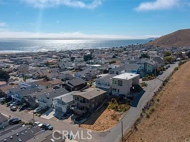 Vacant land opportunity zoned Single Family Residential. Top of the street, corner lot with open space views on one side and potential to build up for expansive ocean views. 2,400 sq.ft. lot with no neighbors on street side! Quiet location in well established and desirable Morro Bay neighborhood. A quick leisure walk or bike ride to the beach or North Morro Bay amenities, including parks, trails, grocery store and eating establishments. Utilities available but not currently connected. Buyer to investigate with City of Morro Bay on future plans and permits.