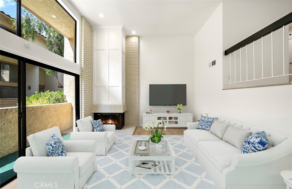 PRICED TO SELL! Completely remodeled condominium in prime Calabasas featuring two bedrooms and three baths. This move in ready home is nestled in one of Southern California's most sought after communities. Beautiful white oak flooring, quartz countertops, designer lighting, high ceilings with spacious rooms and an abundance of natural light. This home also offers an attached two car garage for secure and convinient parking. Just minutes from The Commons, top rated public and private schools, hiking trails, shopping and upscale dining. Come enjoy this incredible lifestyle that Calabasas has to offer.