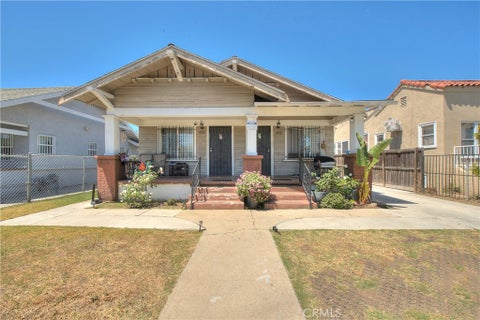 Photo of 1031 W 61st Street, Los Angeles, CA 90044 (MLS # CV26116224)