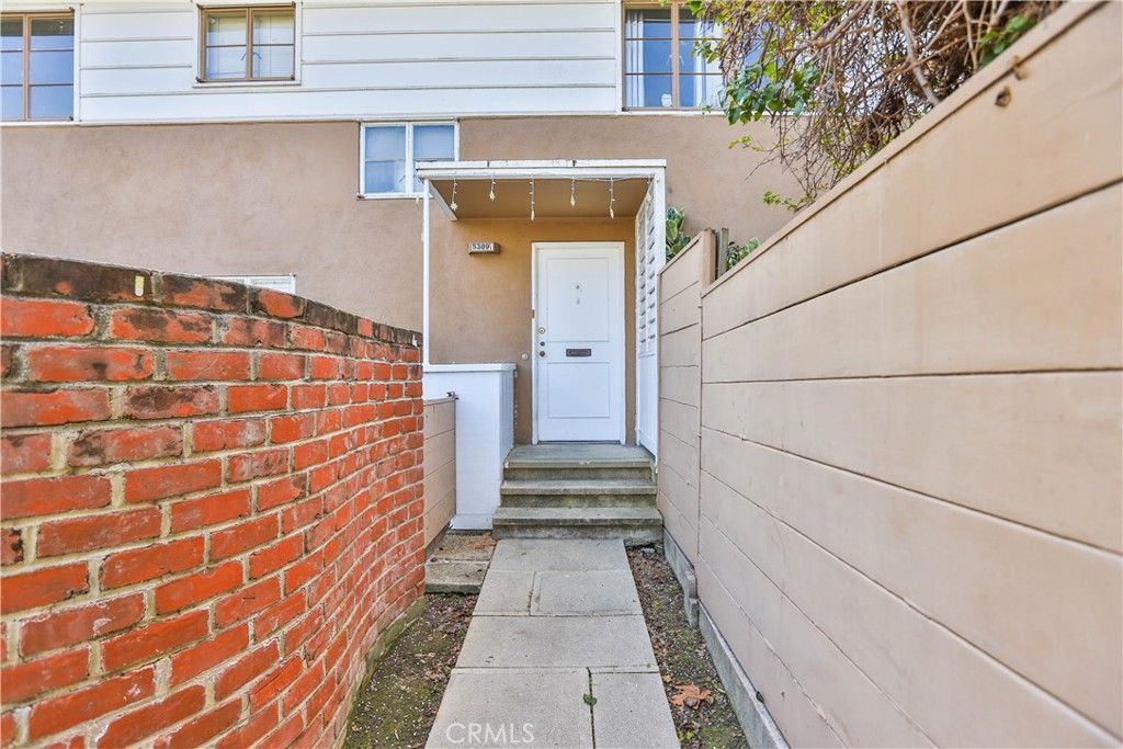 Photo of 5389 Village Grn, Los Angeles, CA 90016 (MLS # DW26025596)