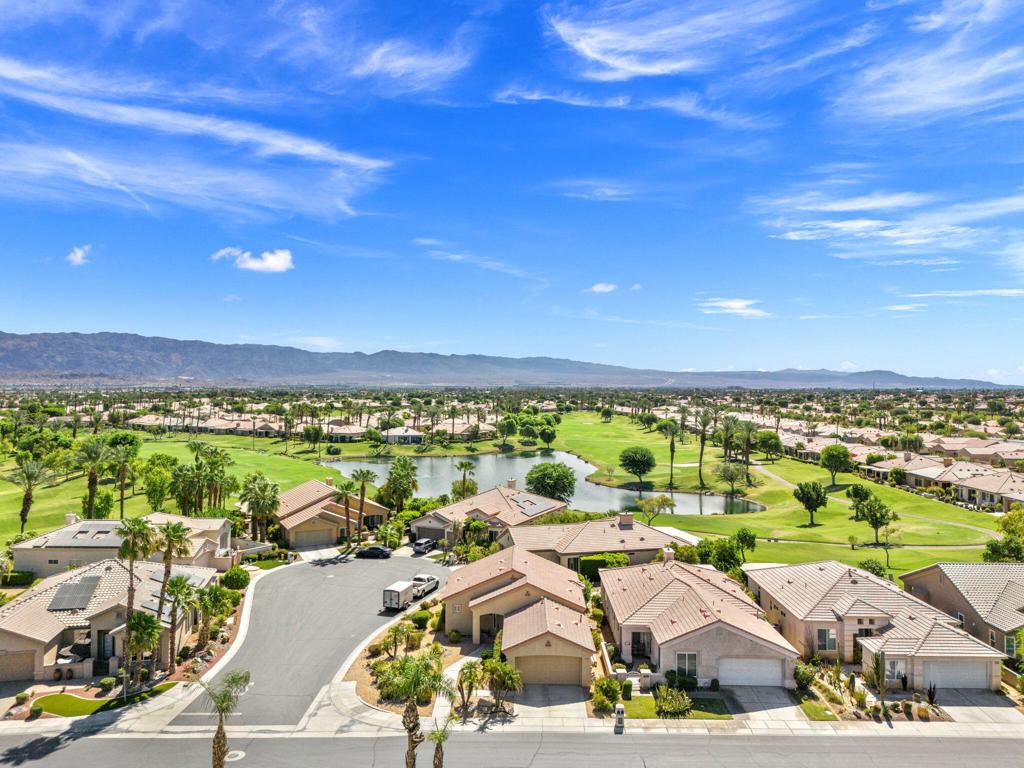 Welcome home to this beautifully remodeled Baltusrol floor plan in gorgeous Heritage Palms Country Club, an active adult (55+) community in West Indio. The owner has completely updated the entire interior with new everything.The photos don't do it justice, it is truly amazing ! Highlighting the long list of changes are large rectangular tile flooring throughout (carpet in primary), a complete makeover of both bathrooms including subway tiles in the primary bath and a honeycomb look in the guest bath, push to open cabinetry, quartz counters, new light fixtures, door handles, baseboards, paint... the list goes on and on. You will not be disappointed with this home nor the community, which features a well manicured 18 hole semi-private par 72 golf course, tennis and pickleball courts, restaurant, fitness center, indoor and outdoor pools and a clubhouse with social activities throughout the year. All renters are required to pay at $300 HOA admin fee for use of all these wonderful amenities and a $25 fee for a vehicle transponder. Call to make an appointment to see in person. May consider lower rent for more than 4 months and the summer months of June-October. No pets allowed.
