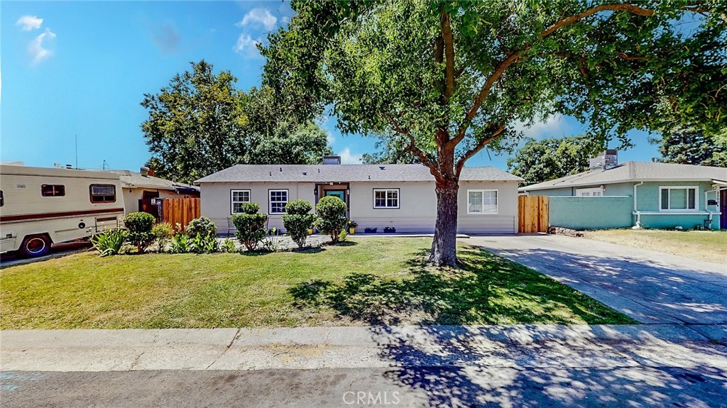 Gorgeous fully rehabbed home, walk into the large open living room with new laminate flooring throughout, attractive ceiling fan and direct access to back yard as you step into the beautiful fully renovated kitchen with new cabinetry, recessed lighting, granite type counter tops, new appliances include Range / oven, microwave and dishwasher and double stainless steel sink with upgraded plumbing fixtures, step over to the formal dining room with new flooring and attractive hanging light fixture to set the mood as you appreciate the newly installed 3/4 bathroom with new cabinetry and mirror, to the right you will find a designated laundry room with hot / cold water set up as well as gas and vent dryer, make your way down the hallway and appreciate the three spacious bedrooms with new plush carpeting, new paint new fixtures and don't miss the second full bath hallway accessible everything fully renovated, step out the newly installed tempered glass duo pane slider to the huge backyard with endless possibilities, certainly has central HVAC system to keep the temperature as desired, this fine home is seeking a new homeowner to call it "Home Sweet Home". Call your real estate agent today to schedule a private viewing tour!