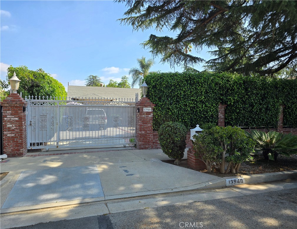 Ideal Property for Developer, Investor or Owner-User !
Situated in the coveted Chandler Estates enclave of Sherman Oaks, this gated property presents a prime opportunity for anyone seeking value, whether remodeling, expanding, or reimagining.
Set back from the street on a 7,080 square foot lot, this beautifully maintained single-story residence originally built in 1958, blends timeless charm and mid-century character. Mature landscaping and a secure gate provide exceptional privacy and a serene setting with a sparkling pool and peaceful patio to enjoy the perfect California lifestyle.
Just minutes from Ventura Boulevard’s shopping, dining, and top amenities, this is a rare opportunity to own a character-filled property in a most desirable neighborhood.