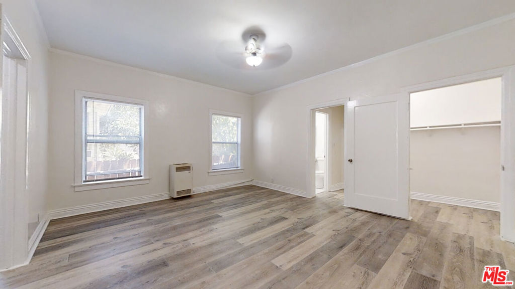 Gorgeously renovated large studio in a trendy location! Hardwood flooring, windows, closet space, kitchen appliances. Common Area Maintenance charge of $150 per month for Water/Sewer/Trash. $45 Application fee. 22 Car Gated Surface Lot.