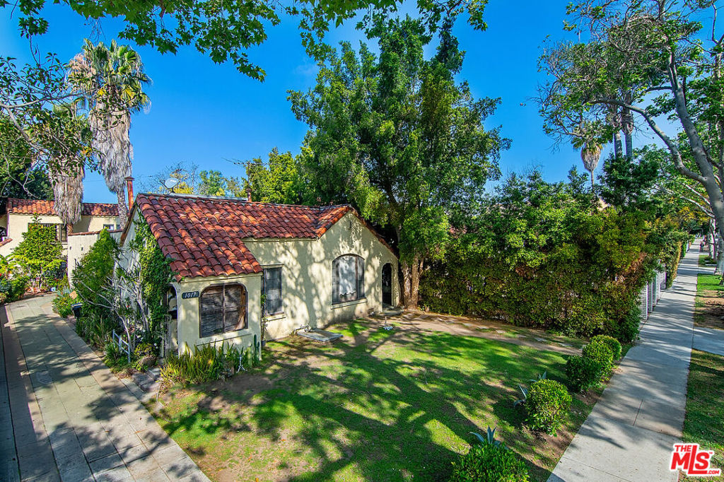 Prime charming West Hollywood character Spanish income property on large lot! There are two buildings on the property. The front building is a single story duplex and the addresses are 1017 and 1019 N Martel. The back building is a two story duplex and the addresses are 1015 and 1015 1/2 N Martel. All the tenants have lived at this property for many many years and are subject to rent control and West Hollywood laws. Please do not disturb tenants. Shown only with accepted offer.