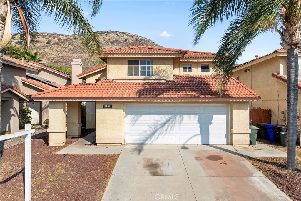 Located in the Southridge community of Fontana, this charming two-story home is ready for your personal touch. Step inside to a bright, open floor plan featuring vaulted ceilings, a cozy living room with fireplace, a convenient half bath, and a welcoming dining area—the perfect combination for both relaxing and entertaining. The spacious kitchen offers an inviting layout, ideal for everyday living and gatherings.
Upstairs, you’ll find three comfortable bedrooms and two full bathrooms, providing plenty of space for family and guests. Outside, a large covered patio creates the perfect setting to enjoy the fresh air and take in the stunning mountain views.
With just a few personal touches, this home offers incredible potential—an excellent opportunity to make it your own and bring your vision to life.