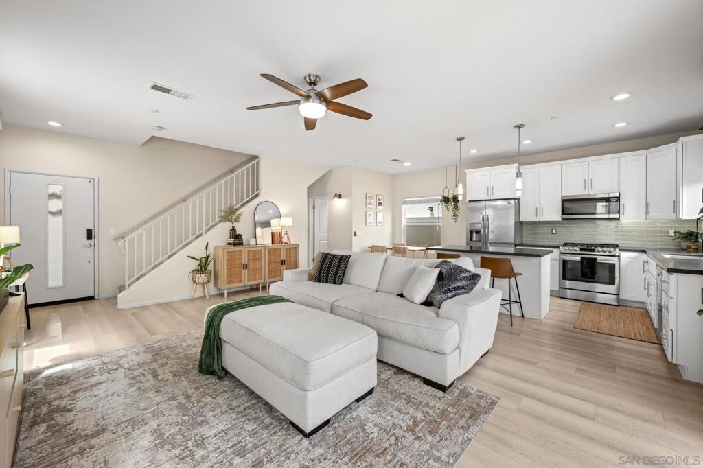 Best-priced 4BR/2BA home in IB! This turnkey, newer-build detached home is located in a gated community and is both FHA & VA approved — it may also qualify for a home grant. Situated in the heart of Imperial Beach, it's just a short stroll from restaurants, retail, and the beach. Built in 2019, the light and airy home features an open-concept floor plan and a beautiful kitchen with stainless steel appliances that flows into the dining and living areas. Downstairs, you'll find a powder room and an attached garage with a new tankless water heater, EV charger, and a permitted 240V outlet. All bedrooms are upstairs, including the spacious primary suite with an en-suite bath featuring a dual vanity, oversized shower, and two closets. Three generously sized additional bedrooms and a hall bath with double sinks complete this level, along with a convenient upstairs laundry. Enjoy a private patio ideal for relaxing and watching the sunset, complete with a storage shed and lattice for added charm and functionality. The home also includes a water softener, French drains, and an irrigation system for added comfort and efficiency. The HOA is $211/month and includes trash, recycling, landscaping, and pest control.The complex offers very low HOA fees and is just a short drive to the Amphibious Base, Coronado, Downtown, and Chula Vista. Don’t miss this one!