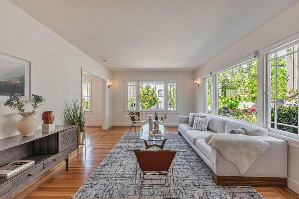 Nestled in North Berkeley's coveted Gourmet District, 1585 Arch Street ideally located just a few blocks from UC Berkeley and within a 5-minute walk to campus, this property provides excellent access to the university and surrounding amenities such as cafes, shops, parks, and transit. Its prime location, strong rental demand make it an attractive opportunity for investors, faculty, students, or professionals seeking convenient, low-maintenance living in a vibrant, intellectually engaging community. This property is a two-story 2BD/1.5BA townhome-style condo that blends classic Art Deco details with modern upgrades. Featuring high ceilings, hardwood floors, and multi-pane double-hung windows, the homes architectural character shines alongside updated kitchen and baths enhanced with stylish finishes and functional design. The light-filled main level offers a spacious living room with wide windows, a sunny dining area, and a modern kitchen with gas range and in-unit washer/dryer. Upstairs, both bedrooms have walk-in closets, and the primary bedroom includes a generous office alcove with serene neighborhood viewsideal for remote work or study. Additional highlights include a beautifully landscaped common area, shared bike storage, and a private single-car garage with extra storage.