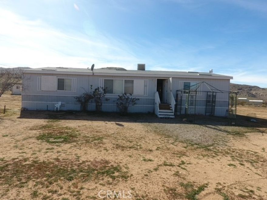 Priced to sell. One of the lowest priced homes in the High Desert. Ready to live a rural liefstyle, come see this home. Features 3 bedrooms and 2 full baths, walk in closet. This possibilites are endless make this fixer upper your own.