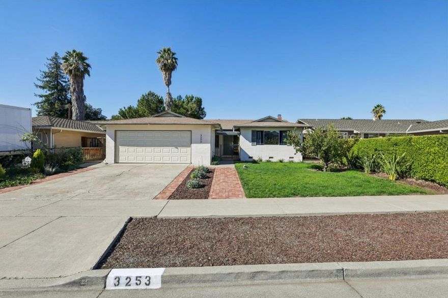 Discover this charming 1,314 sq. ft. home, perfectly situated on a spacious 9,185 sq. ft. lot in the beautiful Alum Rock area of San Jose. Features 4 bedrooms and 2 bathrooms with an open-concept living and dining area that creates a warm and inviting atmosphere. The home is move-in ready with numerous upgrades, including a refurbished kitchen and bathrooms, updated plumbing and electrical systems, a new furnace, water heater, appliances, lighting fixtures, as well as a new garage door and 2 new side entry doors in the garage, and many other improvements. Enjoy updated flooring throughout, adding a modern touch to this classic home. Both front and back yards have been leveled and greened. With generous indoor and outdoor space, the possibilities are endless  add an ADU or expected TESLA tiny houses, build a pool, or expand to fit your lifestyle needs. Conveniently located near highways 680, 280, and 101, this home offers an easy commute and is just minutes from parks, shopping, and Downtown San Jose.