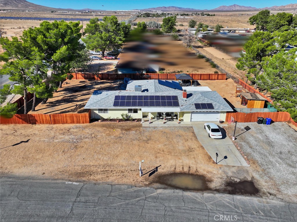This Apple Valley gem offers the best of indoor comfort and outdoor fun! The updated interior features wood looking tile and laminate flooring, a stylish kitchen, updated bathrooms, modern lighting, and new paint throughout. With extra rooms that can be used as bedrooms, this home provides the potential for up to five bedrooms, plus an extra-large great room that’s perfect for gatherings. it has a new roof, a/c and tankless water heater 1.5 years new.
Step outside to your private backyard oasis, complete with a sparkling pool and plenty of space for entertaining, relaxing, and fun. Nestled in a quiet neighborhood, yet close for shopping, schools and commuting, this home is ready to welcome you with both comfort and space.