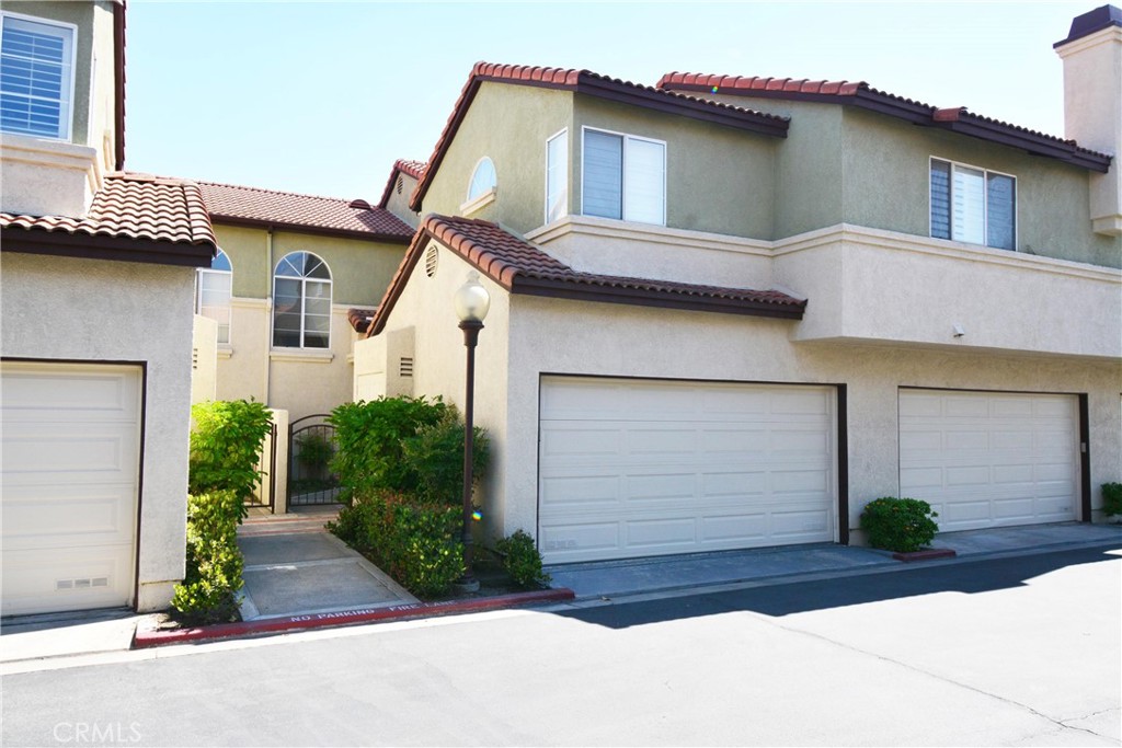 Gated Community, spacious two-story 3 bedrooms, 2.5 baths, 2 Car garage condo. Bright spacious kitchen with central island, and separate laundry area. Fireplace in the living room. Club House has Pool and Spa. Close to all freeways 15, 210, and 10. Few minute driving distance to Victoria Garden Mall, City Hall & another major shopping center. Great schools.
