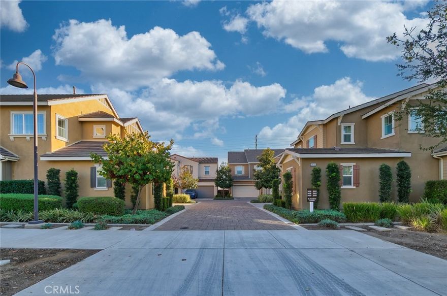 Welcome to the stunning two-story home located in the highly desirable Ontario Ranch community. Built in 2018, this modern residence offers approximately 2,275 square feet of comfortable living space with 4 bedrooms and 3 full bathrooms, including a convenient main-floor bedroom and bath—perfect for guests. The open-concept layout features a bright and spacious great room, a gourmet kitchen with a large center island, granite countertops, stainless steel appliances, and a walk-in pantry. Elegant touches include luxury vinyl flooring, plantation shutters, recessed lighting, and high ceilings. Upstairs you’ll find a luxurious primary suite with dual sinks, a soaking tub, separate shower, and walk-in closet, along with two additional bedrooms and a full Jack-and-Jill bath. Enjoy entertaining in the private backyard with a finished patio and string lights, ideal for gatherings and BBQs. Additional features include a two-car attached garage, tankless water heater, whole-house fan, and energy-efficient construction. Situated within the vibrant New Haven “Avenue” neighborhood, residents enjoy resort-style amenities such as multiple pools, parks, playgrounds, BBQ areas, dog parks, and clubhouse access. Conveniently located near shopping, dining, schools, and major freeways, this move-in ready home perfectly blends modern style, functionality, and community living.