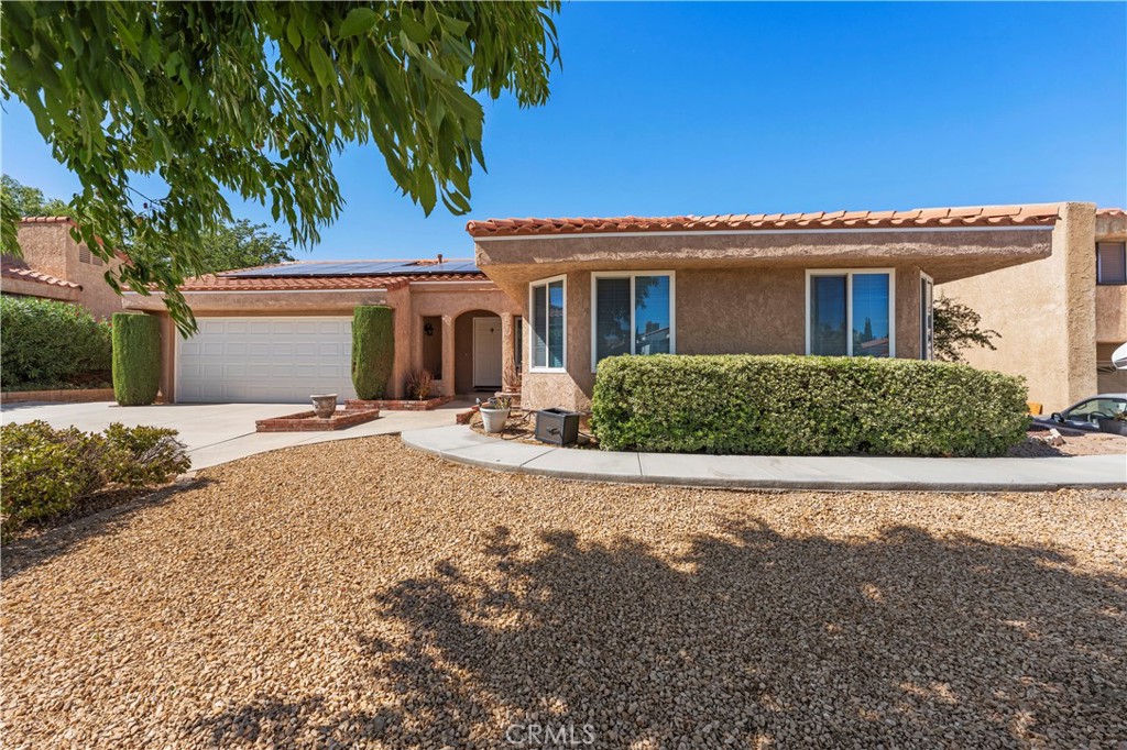 Charming Palmdale Starter Home – Solar, Style & Location!
Welcome to 523 W Avenue Q10 – a beautifully maintained single-story Spanish-style home located in desirable Palmdale West, just minutes from shopping, dining, and Palmdale Regional Medical Center. With over 1,500 sq ft of living space, this 3-bedroom, 2-bath home is perfect for first-time buyers, downsizers, or commuters looking for convenience and comfort.
Step inside to find a bright and open living room with vaulted ceilings, a cozy fireplace, and an abundance of natural light. The updated kitchen features sleek granite countertops and plenty of cabinet space – ideal for cooking and entertaining. The functional layout includes three spacious bedrooms and two full bathrooms, providing ample room for the whole family.
Enjoy energy efficiency and peace of mind with a paid-off solar system and backup battery, keeping utility bills low year-round.
Outside, you’ll love the private landscaped backyard, complete with a built-in BBQ, covered patio, and a large shed for extra storage. The low-maintenance front yard adds curb appeal without the extra work. The attached 2-car garage offers plenty of storage and workspace.
Located just across the street from Manzanita Heights Park and mere minutes to the 14 Freeway, this home is commuter-friendly and close to everything Palmdale has to offer, including the Antelope Valley Mall, DryTown Water Park, schools, and more.
Don’t miss your chance to own this move-in ready home in a growing, vibrant community!