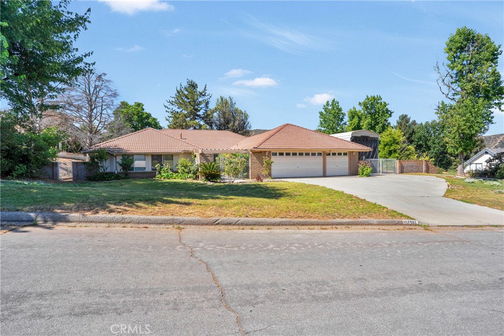 Welcome to Your New Home in Hidden Meadows, Yucaipa!
This beautiful and immaculate 1989 home, appx. 21,300 sq.ft. lot is situated in the highly desirable Hidden Meadows community of Yucaipa. From the moment you step into the landscaped front courtyard, you’ll feel the warmth and charm this home has to offer. Inside, you’ll find 3 spacious bedrooms, 2 full bathrooms, and a convenient half bath for guests. The step-down living room offers a cozy place to relax, while the formal dining room (complete with a built-in wet bar!) is perfect for hosting dinner parties or holiday gatherings. Bedrooms, Living Room and Dining Room are carpeted adding to the warmth of this home. The family kitchen, with gorgeous granite countertops, flows into a comfortable family room with hard-wood floors, a gas fireplace, and built-in shelving—great for both everyday living and entertainment. The guest half bath just off the family room adds a touch of luxury with granite countertops and a modern vessel sink. Need a functional layout? You’ve got it! The laundry room is just off the family room and provides direct access to the attached garage. Retreat to your spacious primary suite, with a large closets, a double sink vanity, dressing area, a separate shower, and a large soaking tub—your personal spa after a long day. Enjoy the enclosed Sun Room living area. Step outside to the large, fenced backyard, where mature fruit trees (including plum, orange, mandarin, grapefruit, and even a walnut tree!) offer beauty, shade, and delicious harvests. There’s also plenty of room for all your toys and tools with RV parking, a 3-car attached garage, and a separate 2-car detached garage—ideal for a workshop or extra storage; and a newer HVAC. This is more than just a house, it’s a home built for comfort, convenience, and making memories.