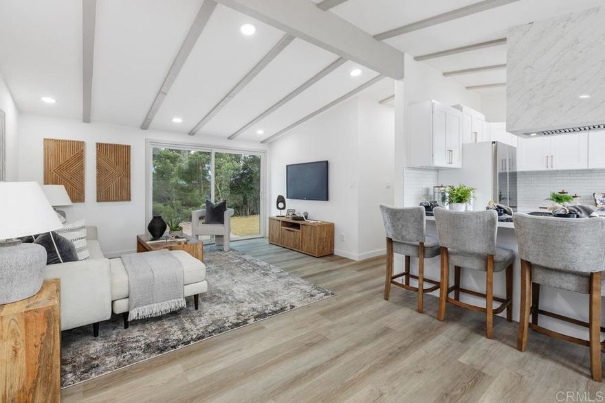 Discover the perfect blend of comfort and style in this beautifully updated 3-bedroom, 1-bath home located in the heart of Clairemont. Thoughtfully remodeled with modern finishes and a bright, open layout, this home embraces the effortless indoor-outdoor vibe that defines San Diego living.  The kitchen features crisp quartz countertops, stainless-steel appliances, and sleek cabinetry — opening seamlessly to the living and dining areas for easy entertaining. Large sliders invite you out to a private, low-maintenance backyard ideal for relaxing, dining al fresco, or hosting weekend get-togethers.  With its inviting curb appeal, modern updates, and central location near shopping, parks, and beaches, this home offers the perfect opportunity to enjoy the best of the coastal lifestyle at an incredible value.