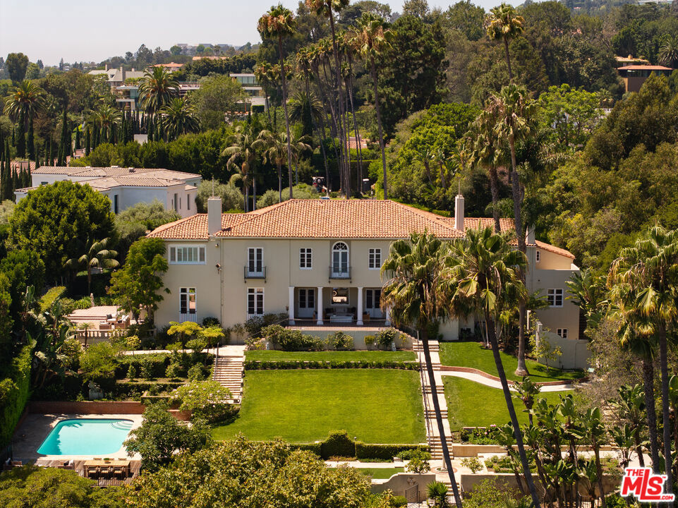 Newly renovated! The properties at 356 and 488 St. Pierre Rd are offered together for lease at $68,500. The two structures sit on on almost 1.25 acres in the heart of Bel Air surrounded by lush gardens, fountains with pool and spa. The private oasis, once home to THE BEATLES, is minutes away from Beverly Hills, Westwood and Brentwood. The main house has a living space of 6310 sqft, with 6 Bedrooms and 7 Baths. This trophy estate has been remodeled with modern upgrades in 2024 while keeping authenticity of its original charm. The main level overlooks the grounds from almost every room with an updated kitchen, new appliances, grand dining room, various living areas and an additional bedroom with en suite bathroom. The upstairs has a primary suite with his and her bathrooms/closets and four additional bedrooms upstairs with en suite remodeled bathrooms. The guest house (344 St Pierre) is 1500 sq ft with 3 bedrooms, 2.5 baths, full kitchen and ample parking. The guest house can be accessed through the main property but also has its separate entrance with additional parking. This is a perfect place for guests, staff, work space, gym et al. Both properties have gates securing the property and updated security systems for safety. This is one you don't want to miss!