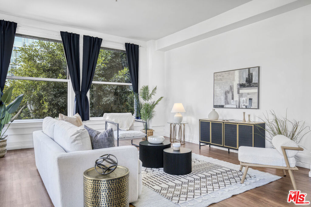 Welcome to the epitome of downtown sophistication found on this exquisite 1-bedroom, 1-bathroom flat, it is an urban oasis perfect for first-time homebuyers, retirees, investors, and digital nomads alike. Nestled in the heart of the Historic Core and mere steps away from the Civic Center District and Little Tokyo, this residence boasts a prime location in a National Historic Building, celebrated for its stunning Neoclassical style, and benefiting from the Mills Act, which translates into significant property tax savings for the new owner. The open loft design, featuring an L-shape corner unit layout, allows for a seamless flow of space, suffused with natural light from the fantastic double-hung windows. Recently refurbished with impeccable taste, the space exudes a fresh and modern vibe. The generous living area, anchored by a modern kitchen equipped with top-of-the-line stainless steel appliances, is perfect for entertaining or quiet enjoyment. The smart, open loft concept offers the flexibility to creatively tailor the space to your needs, with potential to design a second bedroom or an inspiring work-from-home environment.Reside in a piece of Los Angeles history while enjoying the contemporary comforts and conveniences this remarkable home has to offer. Whether you're enjoying the vibrant urban lifestyle or retreating to your tranquil abode, this corner unit in a celebrated historic building is a rare find that encapsulates the best of city living. Make this exceptional property your new home or your next smart investment.