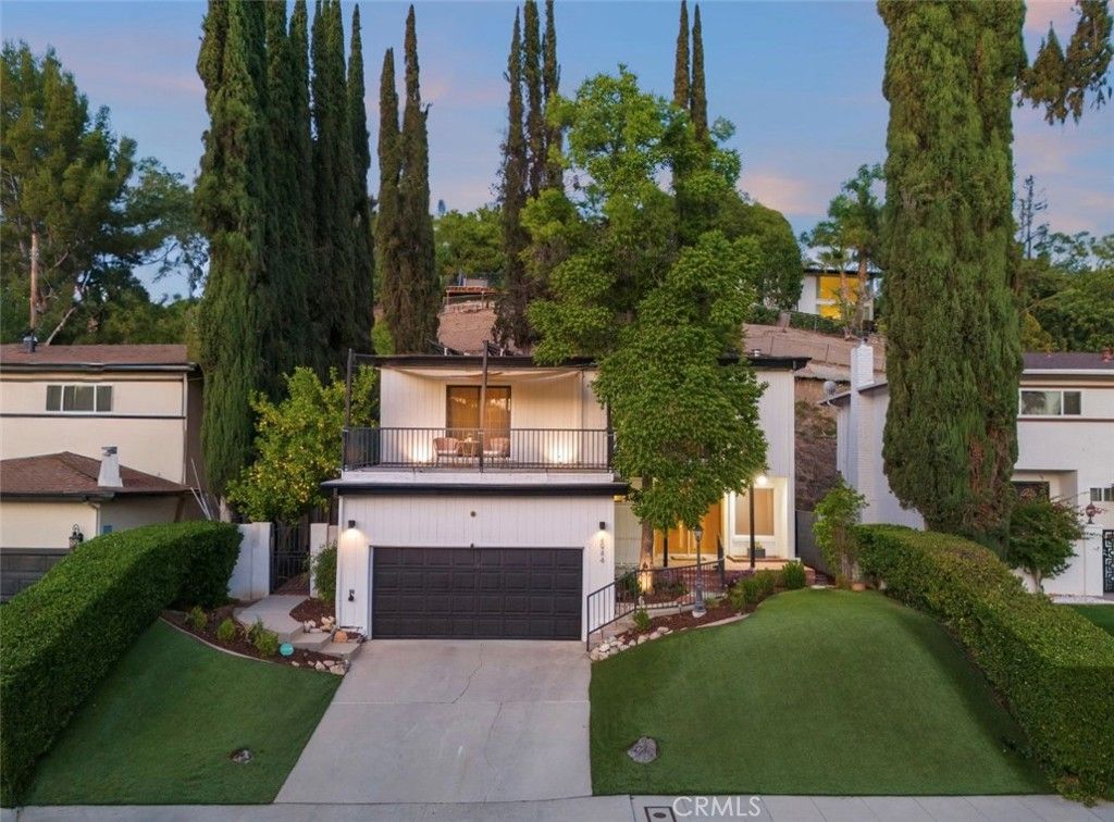 Photo of 4944 Don Pio Drive, Woodland Hills, CA 91364 (MLS # SR25135779)