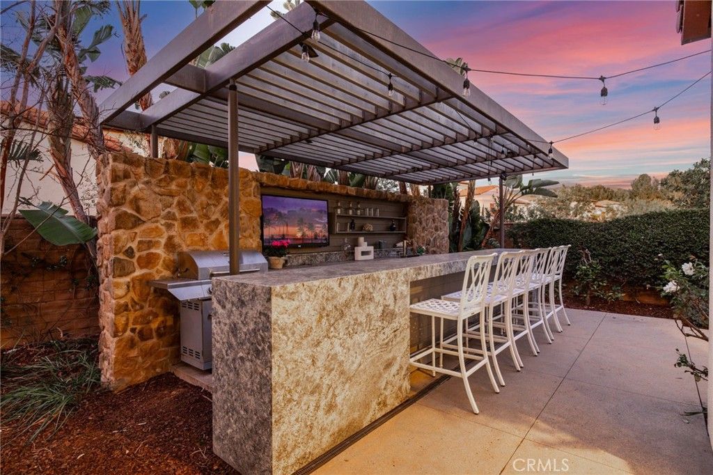 Photo of 95 Sunset Cove, Irvine, CA 92602 (MLS # OC26011074)