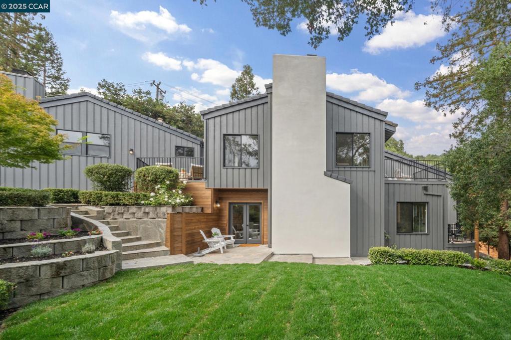 This beautifully renovated 5,165 sq ft residence presents a rare chance to enjoy Lafayette’s coveted Happy Valley. With five bedrooms and four and a half bathrooms, the home blends contemporary design with timeless warmth. Wide-plank white oak floors, designer lighting, and expansive windows highlight the natural beauty of the surrounding landscape. The open-concept kitchen flows into the family room with fireplace and access to the side patio and yard, while the formal dining room is anchored by a second fireplace. A soaring living room offers space to gather, and the upstairs bonus room adds flexibility with direct yard access for easy indoor-outdoor living. The primary suite is a true retreat with a private deck for starry nights and a spa-like bath featuring dual sinks, soaking tub, seamless shower, and sauna. Outdoors, the fenced yard offers peace and seclusion, with a versatile side yard for gardening, play, or pets, and room to personalize. Situated in Lafayette’s sought-after Happy Valley neighborhood, this home combines privacy, natural beauty, and convenience with top-rated schools, downtown, and commuter access all within easy reach. It’s the perfect blend of modern luxury and everyday comfort in one of the East Bay’s most desirable settings.