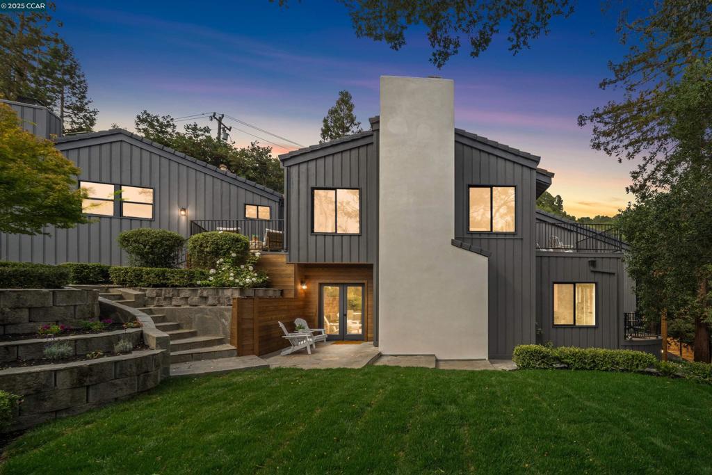 Amazing New Price! This beautifully renovated 5,165 sq ft residence presents a rare chance to enjoy Lafayette’s coveted Happy Valley. With five bedrooms and four and a half bathrooms, the home blends contemporary design with timeless warmth. Wide-plank white oak floors, designer lighting, and expansive windows highlight the natural beauty of the surrounding landscape. The open-concept kitchen flows into the family room with fireplace and access to the side patio and yard, while the formal dining room is anchored by a second fireplace. A soaring living room offers space to gather, and the upstairs bonus room adds flexibility with direct yard access for easy indoor-outdoor living. The primary suite is a true retreat with a private deck for starry nights and a spa-like bath featuring dual sinks, soaking tub, seamless shower, and sauna. Outdoors, the fenced yard offers peace and seclusion, with a versatile side yard for gardening, play, or pets, and room to personalize. Situated in Lafayette’s sought-after Happy Valley neighborhood, this home combines privacy, natural beauty, and convenience with top-rated schools, downtown, and commuter access all within easy reach. It’s the perfect blend of modern luxury and everyday comfort in one of the East Bay’s most desirable settings.