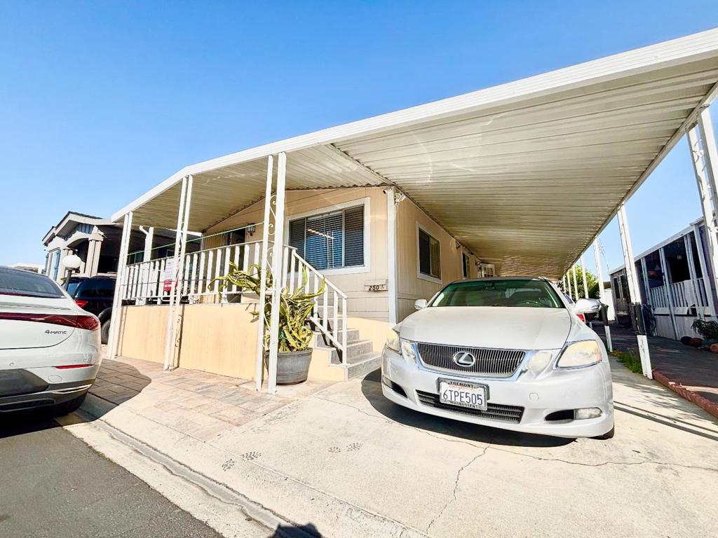 Open-floor plan and move-in-ready mobile home situated in a clean and safe Spanish Cove mobile home park with 3 bed & 2 baths, approx. : 1,040 Sq. The home feautures a spacious living room with high ceiling and skylight in hallway and bathroom. The kitchen is modern with granite counter and complete set of appliances. The master bedroom is spacious with walk-in closet near powder room. Lots of windows around, bringing lots of natural lighting. Lots of window through-out. Central heat, possibly up to 4 car parking spaces, currently has 2 storage shed. Near many restaurants, market, school, bus station and shopping center. Really low space rent at $719.00