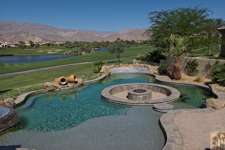 Experience the epitome of luxury living. This stunning estate offers some of the best views in the Andalusia Country Club. This property boasts panoramic south and west vistas, showcasing the majestic mountains, serene lakes, manicured fairways, and lush greenery. As you step into this remarkable home through the private courtyard entry, you are greeted by double entry glass doors, setting the tone for the elegance and quality that awaits within. The interior is designed to maximize the breathtaking views, with floor-to-ceiling glass doors in the great room that seamlessly merge the indoor and outdoor spaces. The chef's kitchen is a culinary masterpiece, adorned with unique granite countertops for your perfect vacation. The house is thoughtfully laid out, with a luxurious main suite, a spacious guest bedroom and includes a two-room casita equipped with its own kitchen. This gives you ample space to accommodate guests in comfort and style. This residence is a haven for entertainment enthusiasts, featuring an equally impressive entertainer's yard. Whether you're hosting intimate gatherings or just hanging out with family, this space offers the perfect backdrop for creating unforgettable memories. The home is finished with travertine floors, providing an elegant and timeless touch. Pictures simply cannot capture the true essence of this breathtaking home. Indulge in the ultimate luxury lifestyle and make this exceptional estate your next vacation destination.