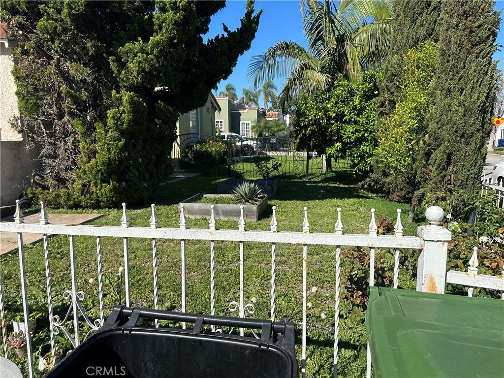 Photo of 8725 S Denker Ave, Los Angeles, CA 90047 (MLS # CV26045978)