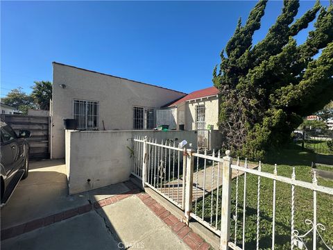 Properties 21 8725 S Denker Los Angeles CA 90047