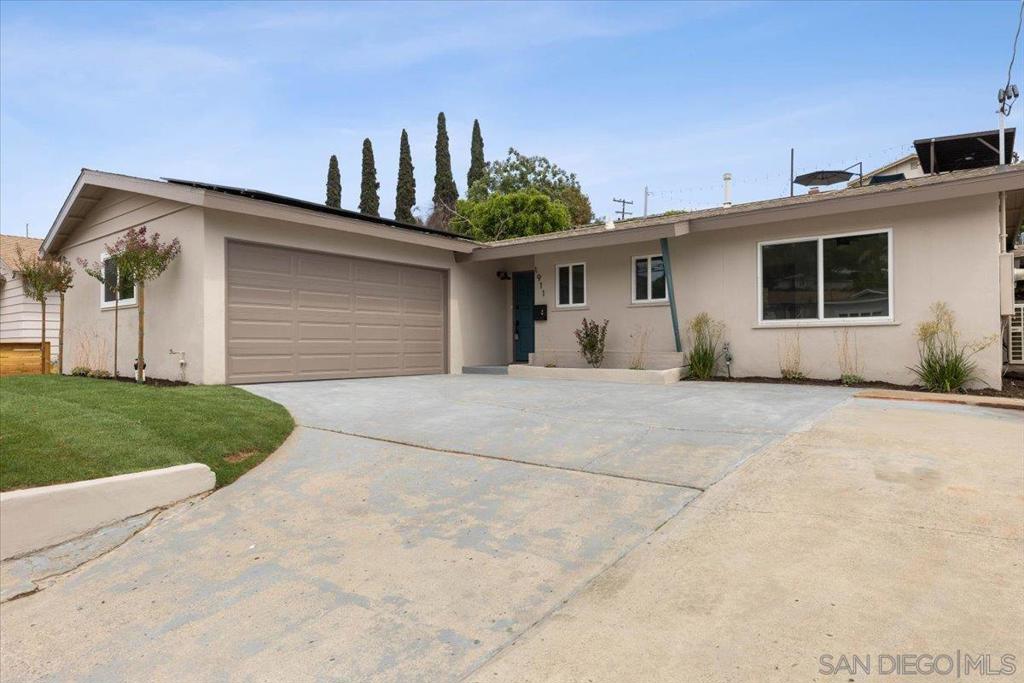 Beautifully remodeled single-story 3 bed, 2 bath home in Lemon Grove featuring an open-concept floorplan designed for both comfort and entertaining. The stylish kitchen offers abundant cabinet space, quartz countertops with a waterfall-edge breakfast bar, chic pendant lighting, and stainless-steel appliances. The spacious primary suite includes a spa-like bathroom with a modern vanity and rain shower head. Additional updates include a newer AC system, updated plumbing with new water heater, and solar panels for energy efficiency. Outdoors, enjoy a generously sized backyard with a large lanai-style patio, garden boxes on the upper level, and plenty of space for gatherings or relaxation under the stars. An oversized 2-car garage and optional RV parking complete this move-in-ready home.