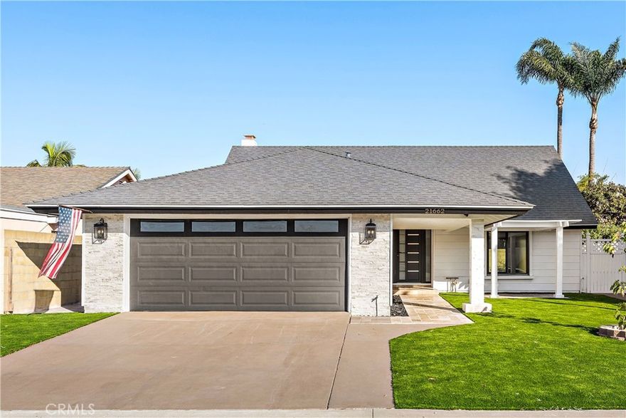 Newly remodeled beautiful single-family home located on a quiet cul-de-sac in South Huntington Beach. This 4-bedroom, 3-bath residence offers 2,127 sq. ft. of modern coastal living on a 6,050 sq. ft. lot. The home features an open and inviting floor plan with new vinyl plank flooring, recessed lighting, and black-framed windows throughout. The designer kitchen is equipped with shaker-style soft-close cabinetry, new stainless steel appliances, and quartz countertops. The spacious primary suite offers an ensuite bath and ample closet space. Three additional bedrooms (with one on the ground floor) provide flexibility for guests, family, or a home office. Additional highlights (new updates) include air conditioning, washer and dryer, finished garage with epoxy flooring, and a low-maintenance rear yard perfect for relaxing or outdoor dining. The property’s inner track location offers proximity to award-winning Huntington Beach schools, local parks, shopping, dining, and is within walking distance to the beach. Experience refined California Coastal style in one of Huntington Beach’s most desirable neighborhoods.