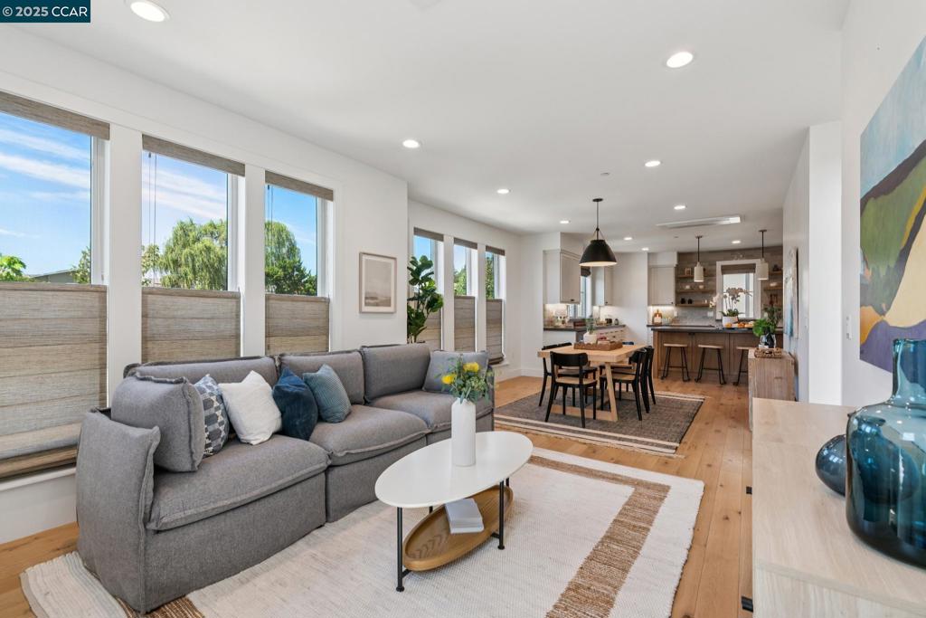 Built in 2022 this sunny, end-unit, townhome blends modern design with stylish sophistication. ENTRY LEVEL Offers direct access from the large two-car garage into a versatile bonus room. SECOND LEVEL Open-concept living showcases a chef's kitchen that seamlessly flows into dining area and comfortable living room, creating an ideal setting for everyday living and entertaining. THIRD LEVEL Features two ensuite bedrooms, each with its own balcony. ROOF TOP DECK RETREAT Enjoy the sweeping views and sunset while sipping your favorite drink. CONVENIENT LOCATION Situated in the heart of downtown, this exceptional property offers easy access to popular restaurants, shops, BART, vibrant community amenities, nearby hiking, biking, and recreation areas—right at your doorstep. Open Sunday 2-4. Come See! Views: Downtown