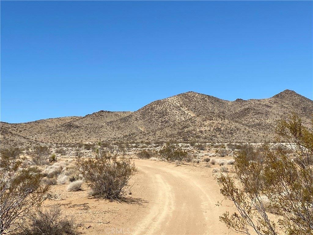 5 acres located on the Yucca Mesa with amazing views GPS Coordinates 34.245197, -116.359728 The property is not located on Kuna Ave. Kuna Ave is the closest assigned street that leads to the road to the front of the lot. If you are looking for a piece of land to get away for the weekend and camp out or build an isolated home this lot is perfect for you. Away from everything on a dirt road you will find this amazing lot where you can camp out and off-road or build a home on your very own piece of the American dream. Located just 15 minutes from downtown Yucca Valley.