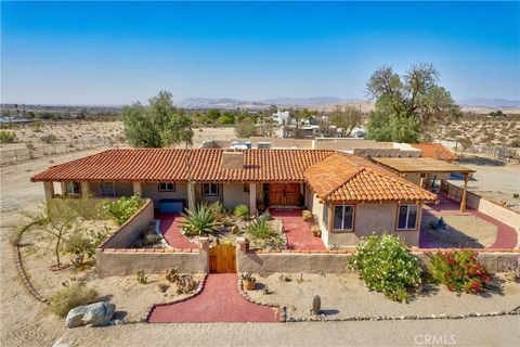 Photo of 74784 Foothill Drive, 29 Palms, CA 92277 (MLS # JT26032681)
