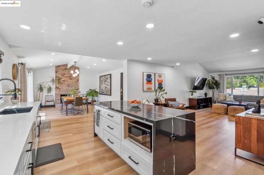 Welcome to 3093 Diablo View Rd, a light-filled home with soaring vaulted ceilings and an inviting open-concept design. The kitchen has been thoughtfully updated, both bathrooms have been beautifully remodeled, and the home features new flooring and recessed lighting throughout. Every detail reflects the care and pride of ownership, making this residence truly move-in ready. Abundant natural sunlight pours through the living spaces, creating a seamless flow to the private backyard patio—ideal for entertaining friends and family. The neighborhood is highly sought after for its strong community feel, while also enjoying enviable proximity to Lafayette and Walnut Creek, with great dining, boutique shopping, and recreation just minutes away. Easy access to BART, freeways, and beloved destinations like Larkey Park and nearby hiking trails round out the perfect balance of convenience and lifestyle. Blending modern updates with timeless charm, this home offers a rare opportunity in one of Pleasant Hill’s most desirable neighborhoods. Whether you’re looking for a peaceful retreat, a place to put down roots, or a home that captures the very best of East Bay living, 3093 Diablo View Rd delivers it all—a home that  feels warm, welcoming, and should not be missed!