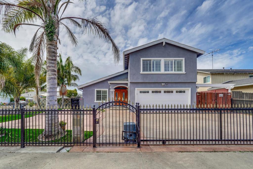 Welcome to this delightful home located in the vibrant city of Union City. Spanning over 2,031 sq ft, this residence offers ample space with 4 Bedrooms, Oversized Bonus Room, and 2.5 Bathrooms. The kitchen is a culinary enthusiast's dream, featuring an electric cooktop, granite countertops, a dishwasher, garbage disposal, hood over range, microwave, and refrigerator, all designed for convenience and style. The family room seamlessly integrates with the kitchen, making it ideal for entertaining and family gatherings. Enjoy cozy evenings by the fireplace in the family room or dining area. The home boasts a variety of flooring options including laminate, stone, and tile, which add to its charm and elegance. Practical amenities such as a skylight and walk-in closet enhance the living experience. The laundry is conveniently located in the utility room, complete with a washer and dryer. Situated within the New Haven Unified School District, this home is perfect for families seeking a comfortable and functional living space. Central AC and forced air heating ensure year-round comfort. Additionally, it includes a spacious two-car garage.