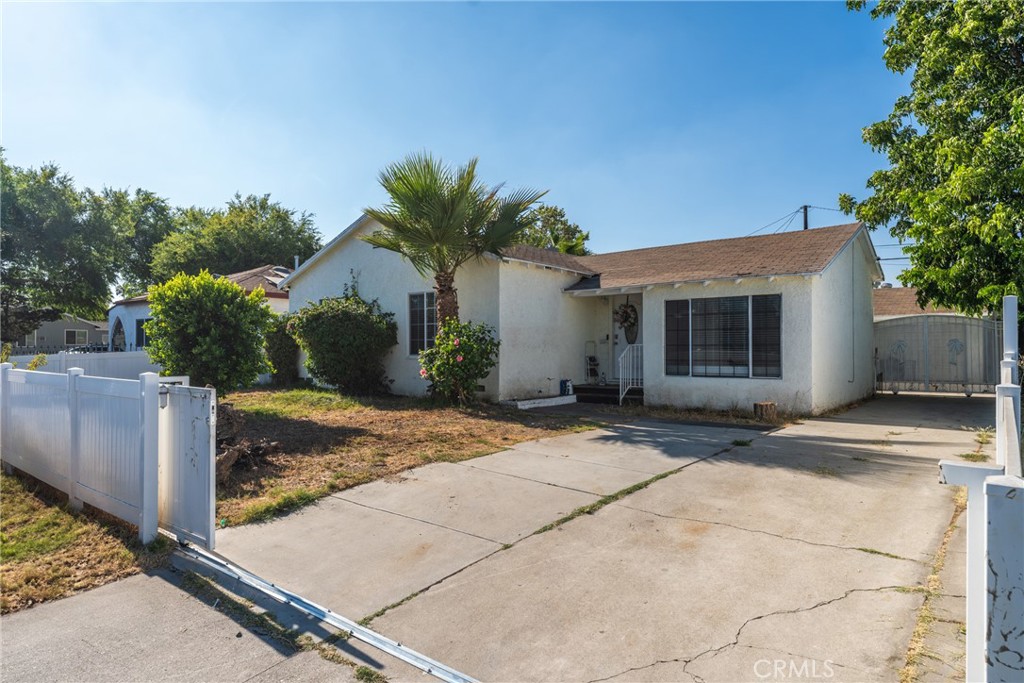 Welcome to 1456 W Base line Rd, fantastically located across the street from Graciano Gomez Elementary School, shopping centers, restaurants and conveniently located near 210/215 freeways for easy commute. This 3- bedroom, 2- bathroom home offers the perfect blend of comfort and convenience with an open floor plan for modern living and entertaining. Home features wood floors throughout, recently updated kitchen and a 3rd bedroom with its own restroom. Home also offers an oversized two car garage for a potential ADU for passive income or additional storage. Front yard has a brand new vinyl fencing providing privacy and safety for you and your family. Do not miss out on everything this home has to offer.