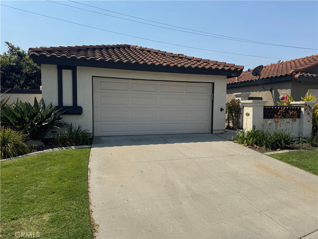 Welcome to a beautifully upgraded single-level home that combines the best of modern living with an incredible coastal lifestyle. Nestled on a peaceful cul-de-sac, this 3-bedroom, 2-bath residence offers a perfect blend of style, comfort, and convenience, all just five miles from the beach. Step inside to a bright and open floor plan, where stunning tile flooring flows seamlessly throughout the main living areas, creating a clean and elegant feel. The heart of the home is the updated kitchen with sleek granite countertops, an abundance of cabinetry, and modern appliances that make cooking a joy. Each of the three bedrooms is a private retreat, featuring a ceiling fan for year-round comfort and ample closet space. The two full bathrooms have been tastefully updated with contemporary fixtures and finishes. Outside, the private backyard is a peaceful sanctuary for relaxation or gatherings. Enjoy the bounty of your very own fruit tree and create lasting memories in this outdoor haven. INTERIOR PICS WILL BE UPLOADED FRIDAY