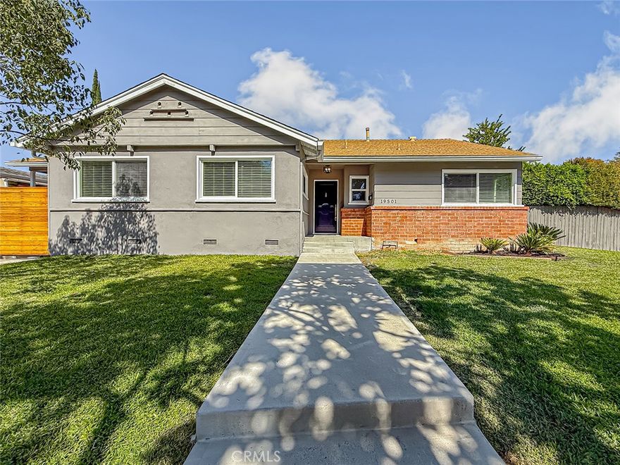 Welcome to your dream home in the heart of Tarzana!

This beautifully remodeled single-story 4-bedroom, 2-bath pool home sits on an expansive 9,400+ sq. ft. corner lot, surrounded by mature privacy hedges for a perfect blend of charm and seclusion.

Step inside to discover an open, light-filled floor plan featuring a spacious living room, a dedicated dining area, and a modern kitchen with new flooring, stone countertops, stainless steel appliances, a stylish sink and fixtures, and a large center island—perfect for everyday living and entertaining alike.

Additional highlights include fresh interior paint, smooth ceilings, copper plumbing, an upgraded electrical panel, newer cedar fencing, and a detached two-car garage with high ceilings and ADU potential, plus a carport with gated pull-through RV access.

The backyard is a private retreat designed for relaxation and fun, complete with a sparkling pool, covered patio, and lush landscaping—ideal for hosting gatherings or unwinding in your own oasis.

Perfectly situated on a peaceful, tree-lined street, just steps from a local park and scenic bike path, this move-in-ready Tarzana gem combines modern comfort, timeless character, and endless possibilities.

Come see it before it’s gone!
