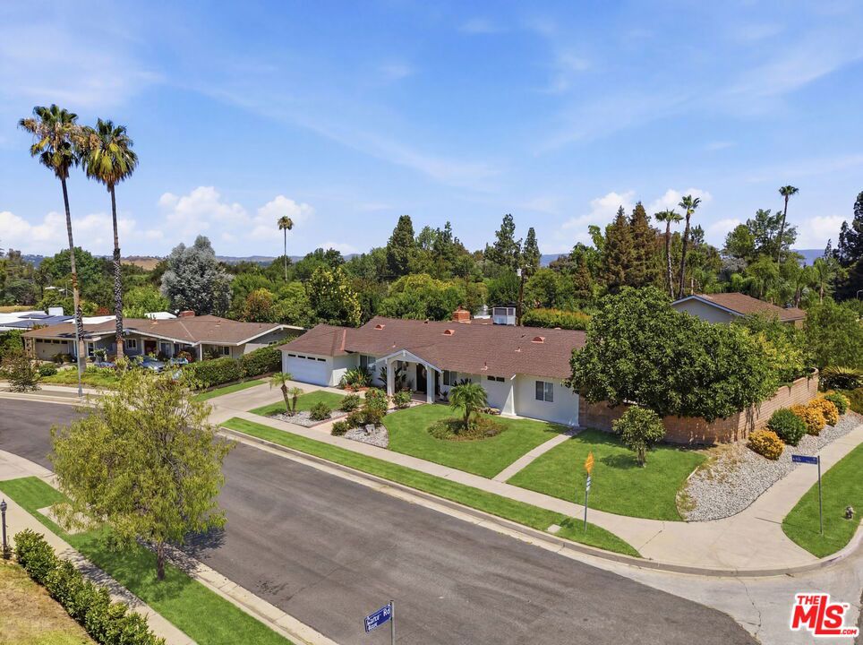 Photo of 23001 Lita Place, Woodland Hills, CA 91364 (MLS # 26101634)