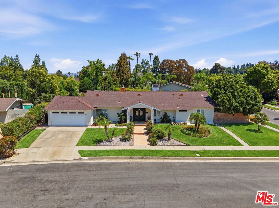 Photo of 23001 Lita Place, Woodland Hills, CA 91364 (MLS # 26101634)
