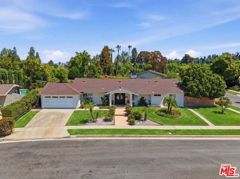 Photo of 23001 Lita Place, Woodland Hills, CA 91364 (MLS # 26101634)
